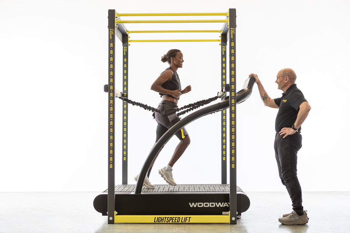 Coach working with an athlete in the LSX-500