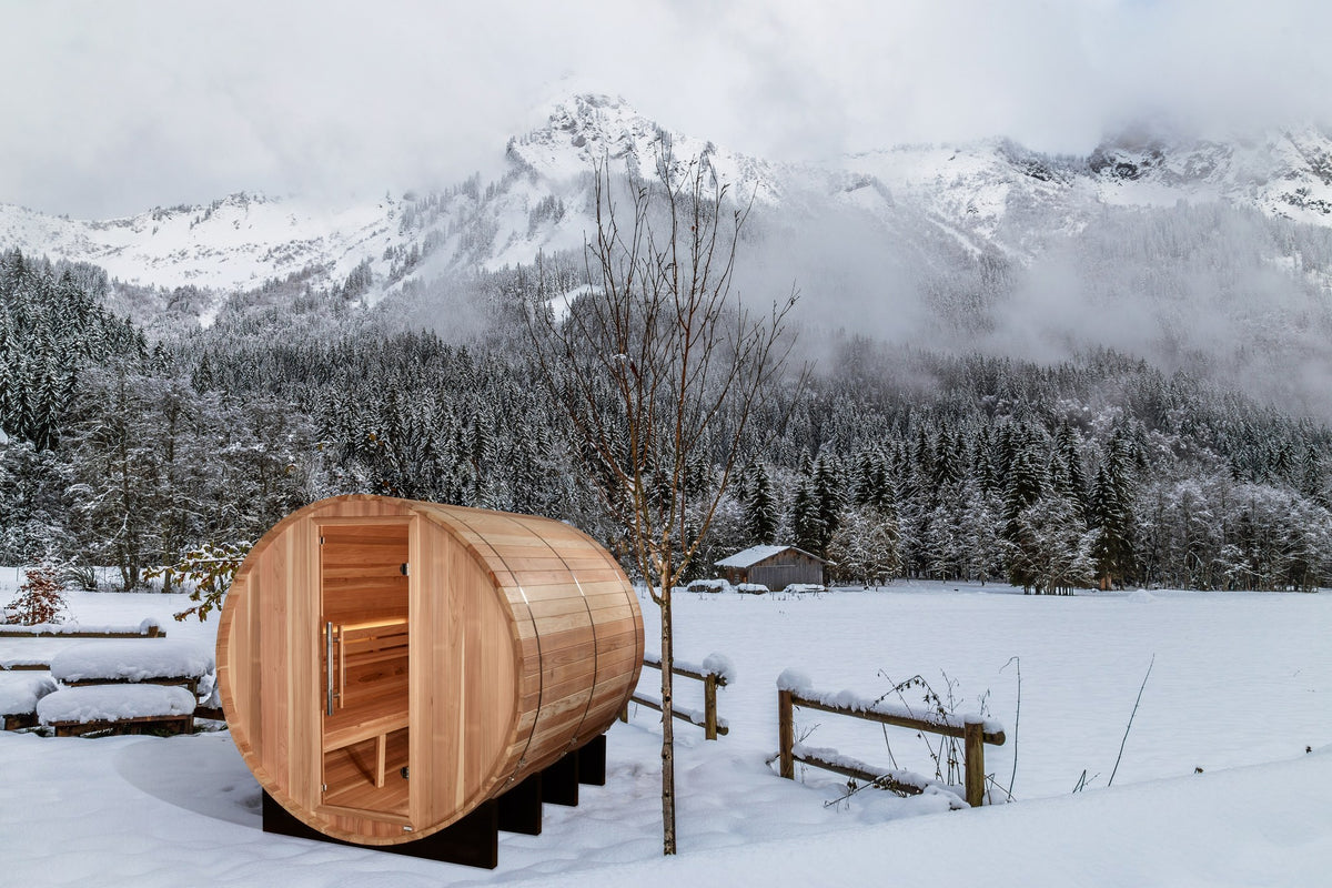 Golden Designs Klosters 6-Person Traditional Barrel Sauna in a winter setting