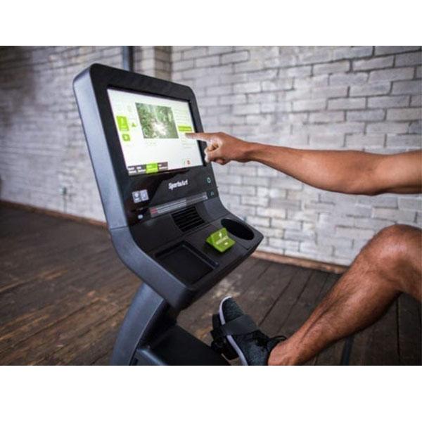 Rider using the SENZA touchscreen