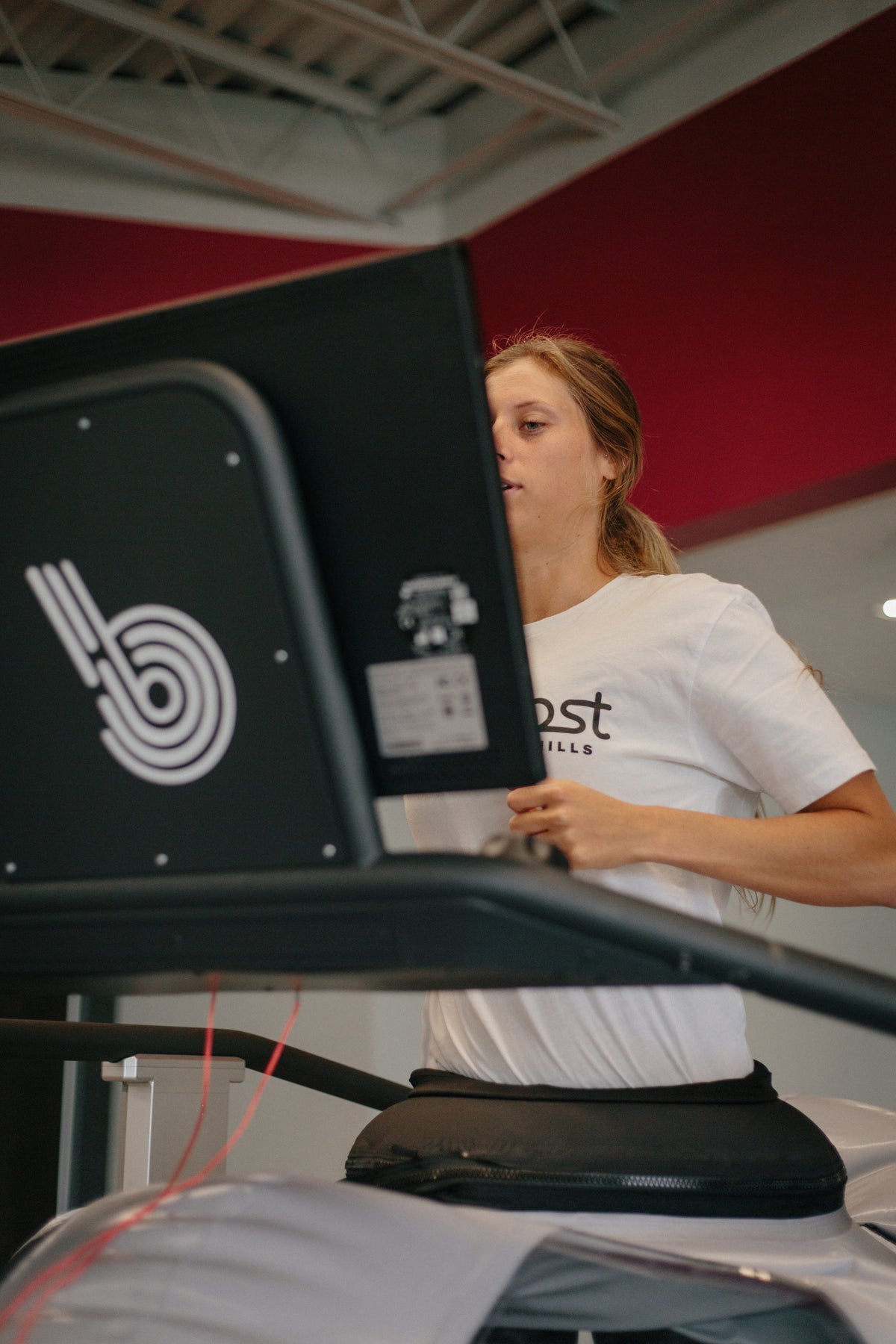 Athlete training on a Boost treadmill
