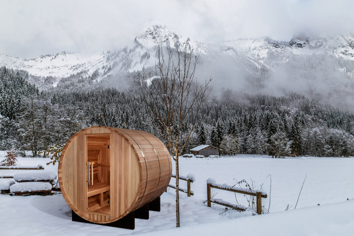 Golden Designs Arosa 4-Person Traditional Barrel Sauna in a winter setting