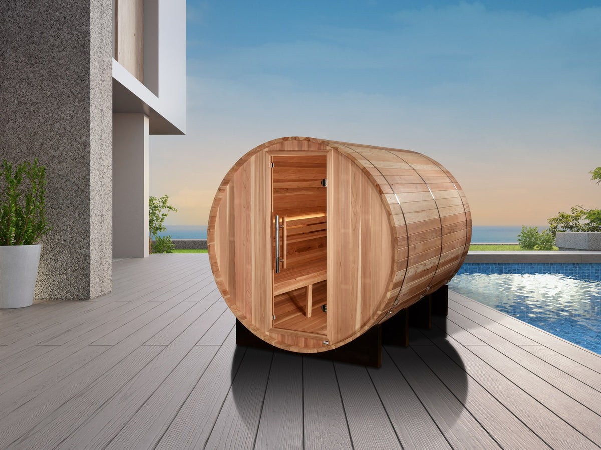 Golden Designs Klosters 6-Person Traditional Barrel Sauna beside a home