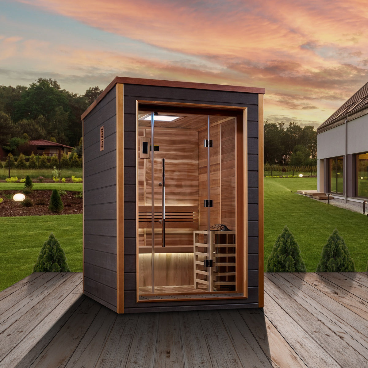 Golden Designs Narvik 2-Person Traditional Outdoor Sauna beside a home