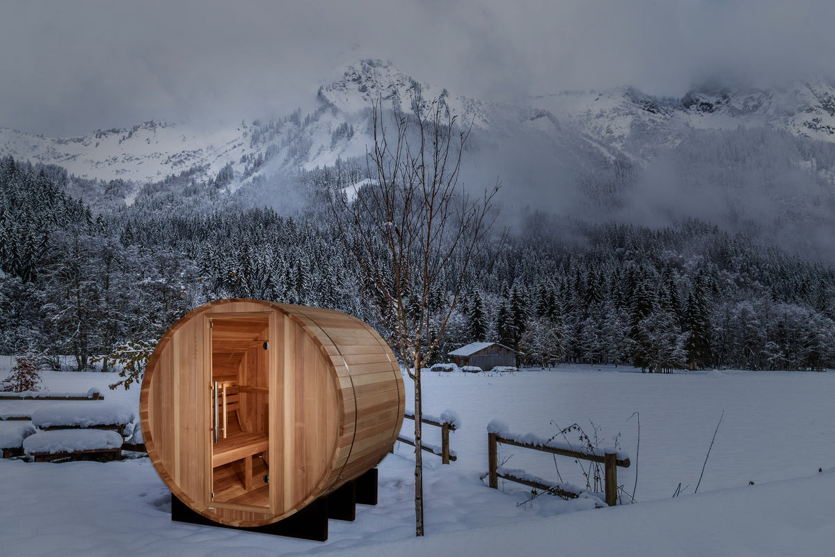 Golden Designs St. Moritz 2-Person Traditional Barrel Sauna in a winter setting