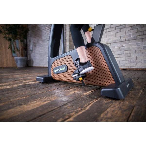 Rider pedaling beside the C576U's perforated side panel