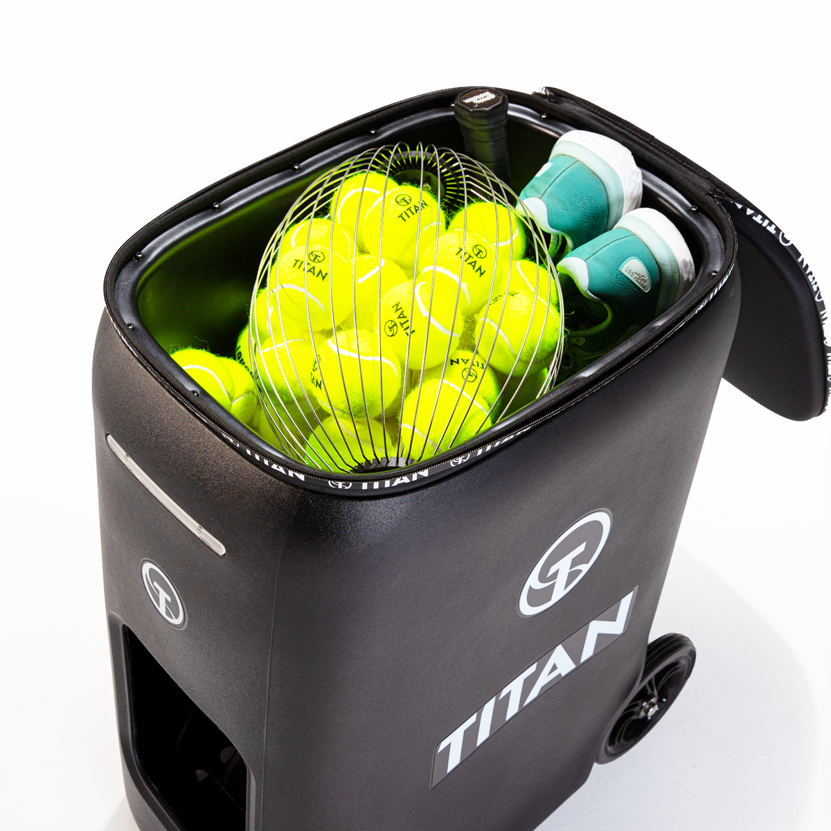 Titan ONE all-in-one hopper holding tennis balls and water bottles